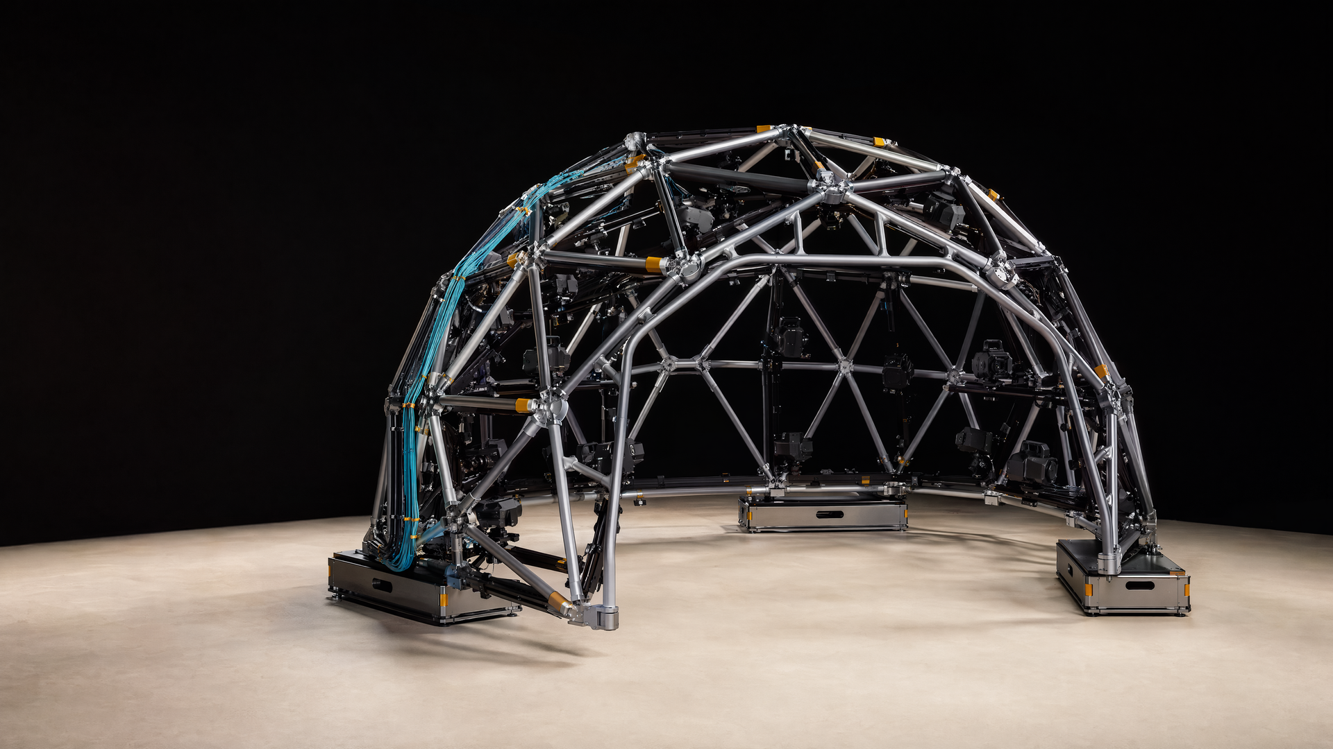 A portable surround array built to open, travel and return to shape. Representative StelMount structure